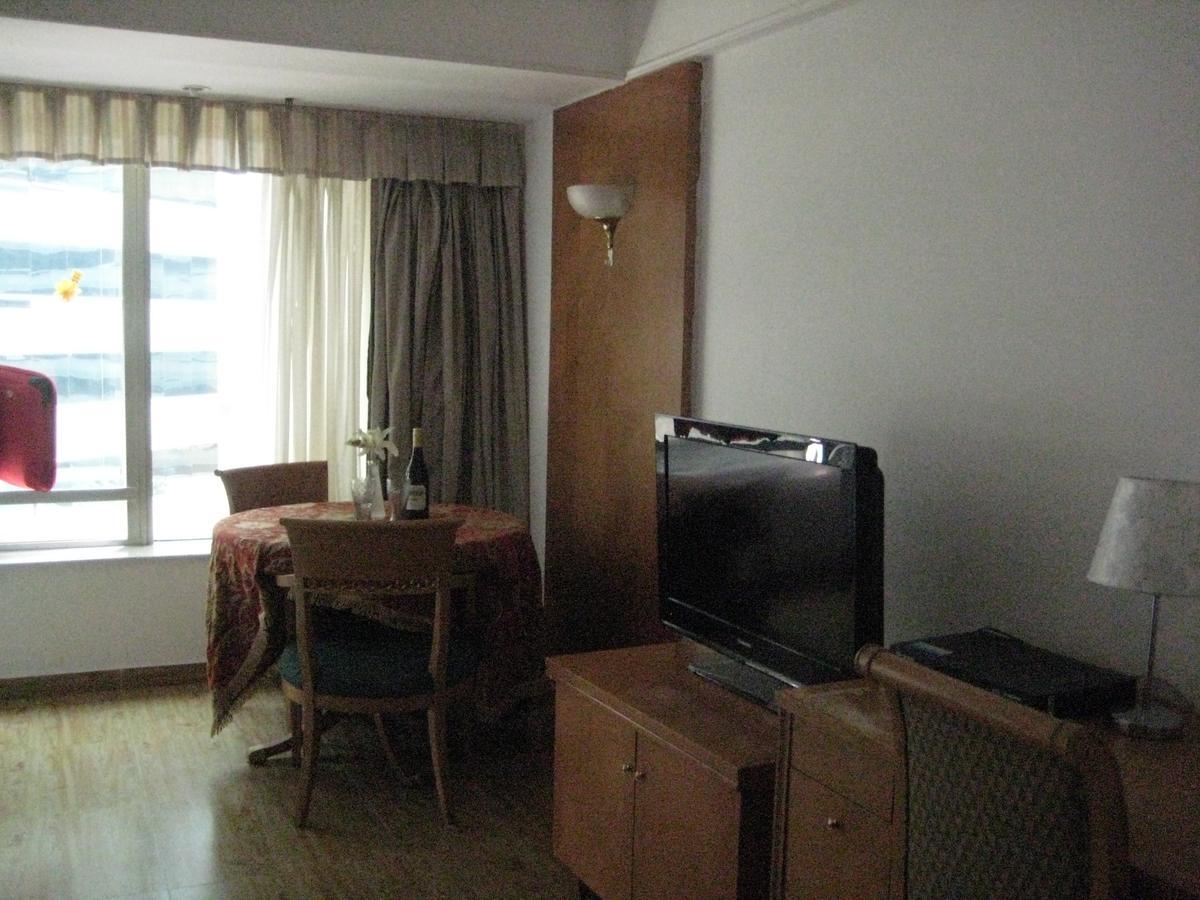 Beijing New World Centre Aparthotel Экстерьер фото